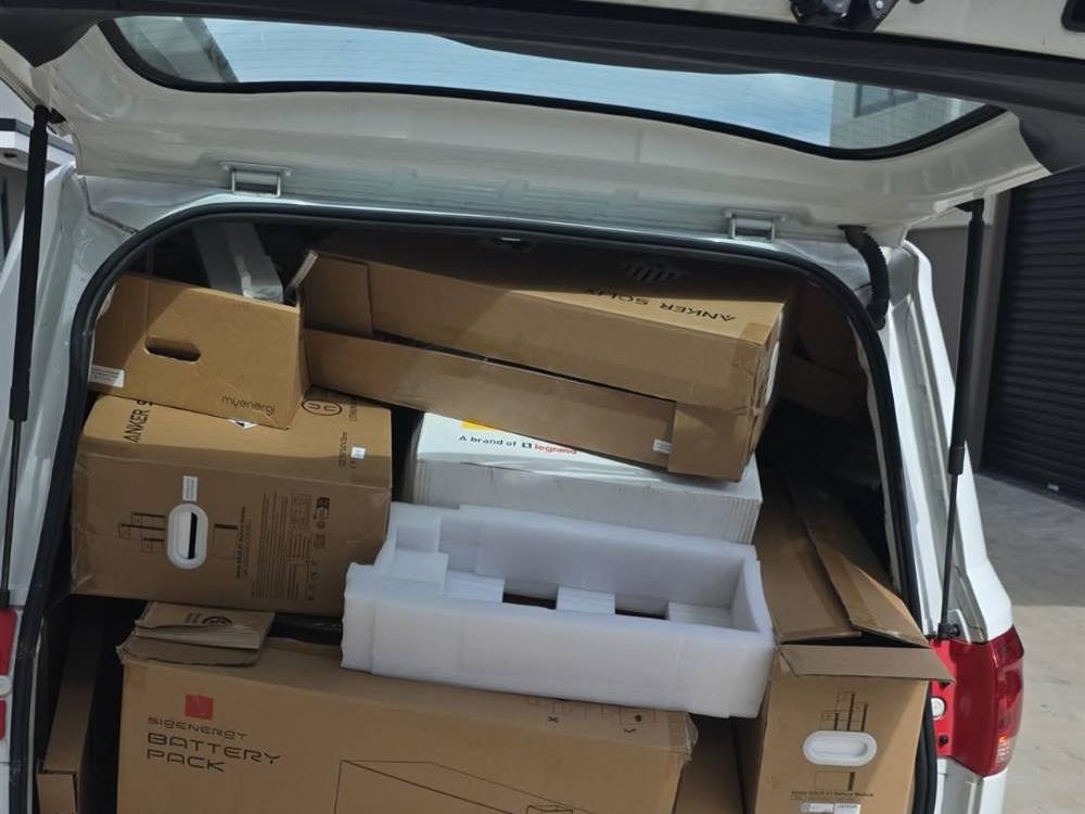 Lanky Services van loaded with boxes after a pickup and delivery, Central Coast