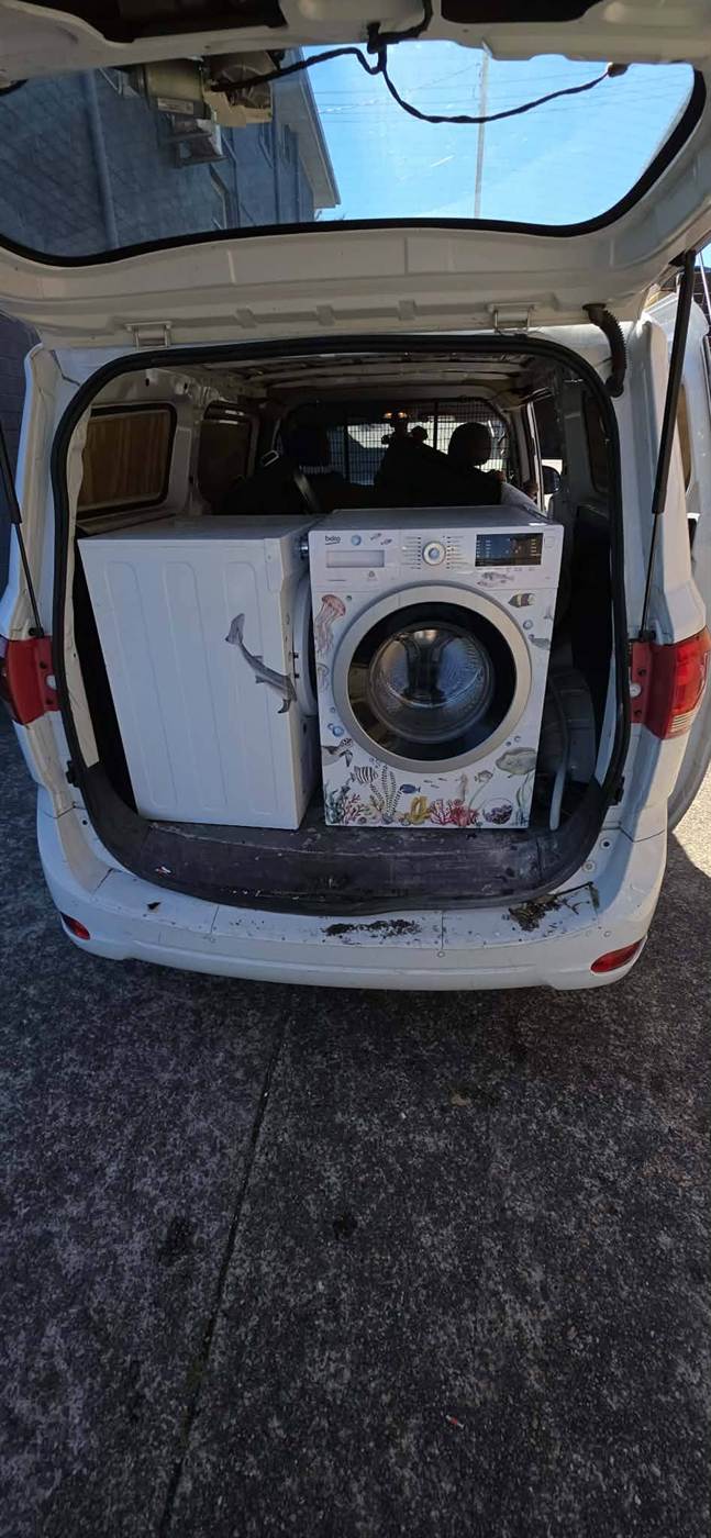Van loaded with washing machines and whitegoods, Central Coast